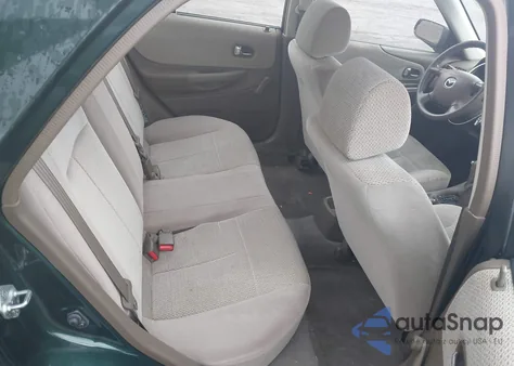 2000 Mazda Protege Dx/Lx z USA, uszkodzony, nr VIN JM1BJ2221Y0304773